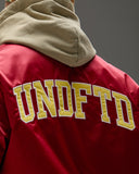 UNDEFEATED ICON SATIN VARSITY JACKET