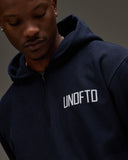 UNDEFEATED QUARTER ZIP PULLOVER HOOD