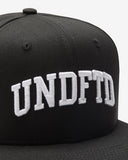 UNDEFEATED ARCH SNAPBACK