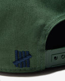 UNDEFEATED SCRIPT LOGO SNAPBACK