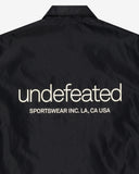 UNDEFEATED INC. COACHES JACKET