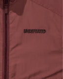 UNDEFEATED MESH POCKET TRACK JACKET