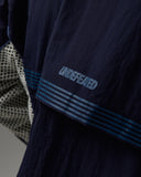 UNDEFEATED NYLON QUARTER ZIP PULLOVER