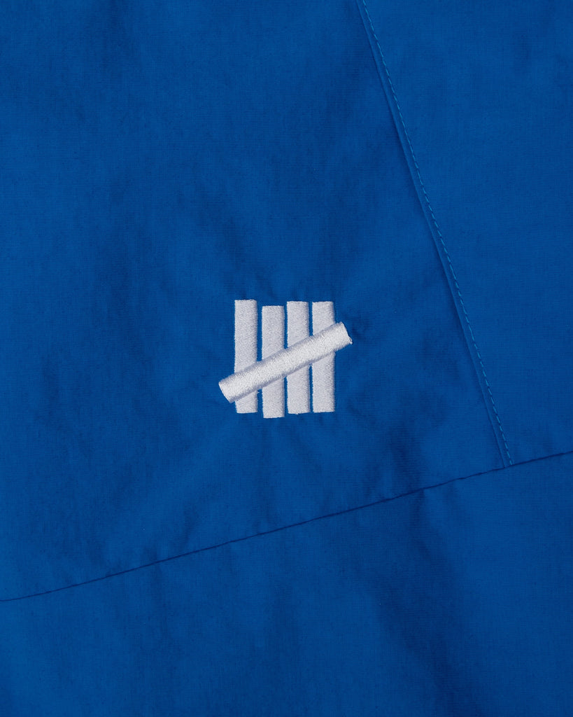 UNDEFEATED MOUNTAIN WINDBREAKER