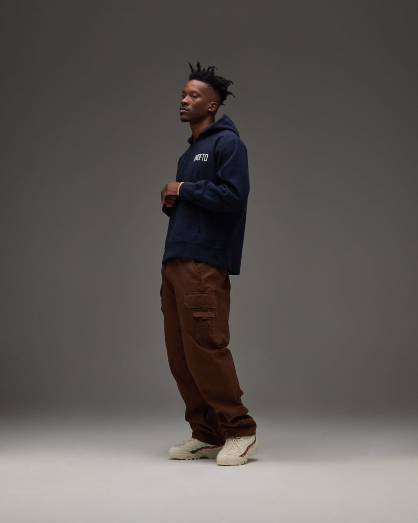 UNDEFEATED QUARTER ZIP PULLOVER HOOD