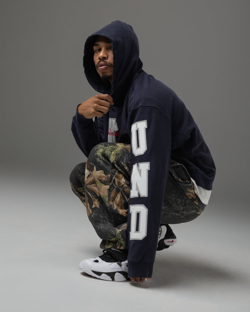 UNDEFEATED APPLIQUE PULLOVER HOOD