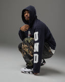UNDEFEATED APPLIQUE PULLOVER HOOD