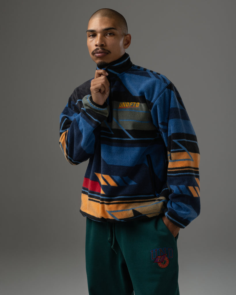UNDEFEATED HALF ZIP POLAR FLEECE