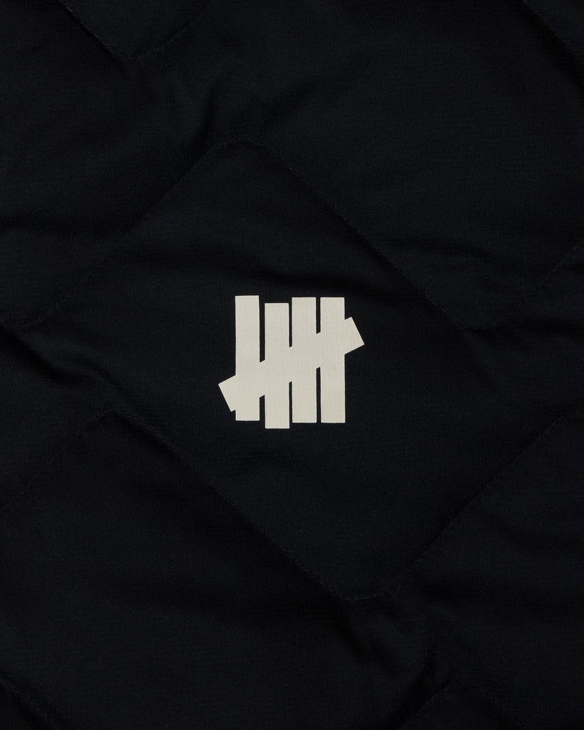 UNDEFEATED QUILTED DOWN JACKET