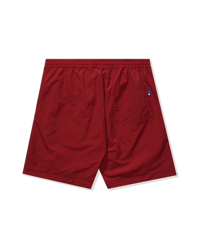 UNDEFEATED ARCH NYLON SHORT