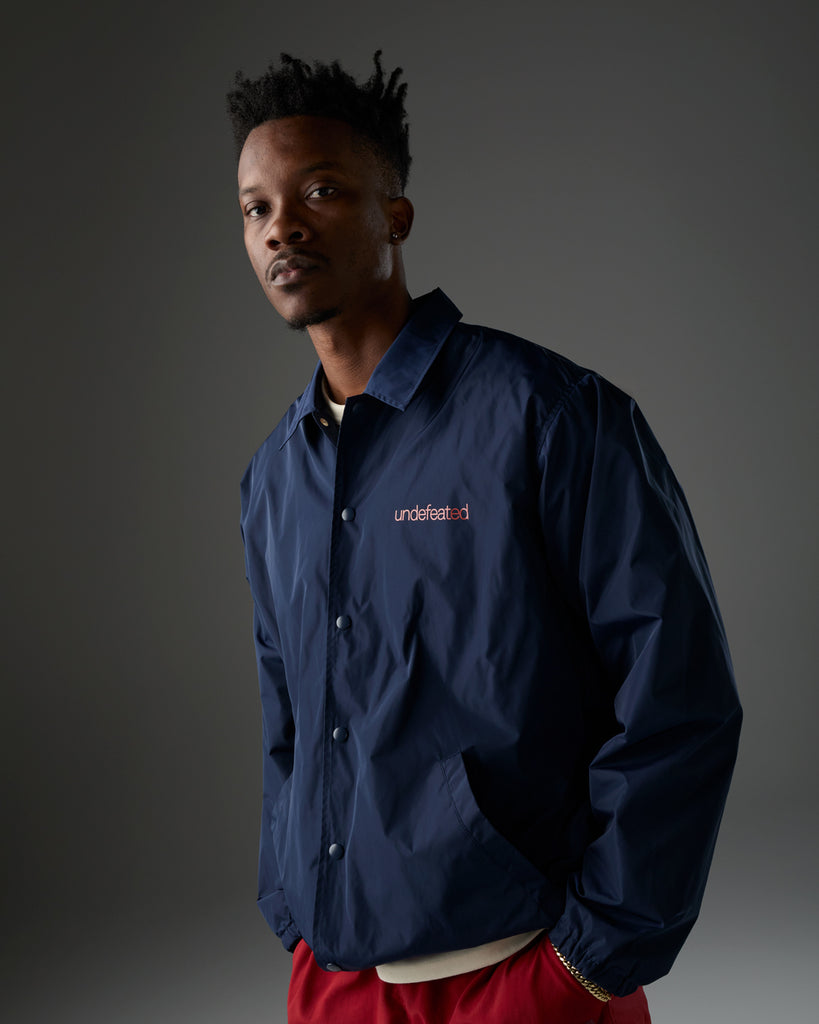 UNDEFEATED INC. COACHES JACKET