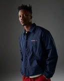 UNDEFEATED INC. COACHES JACKET