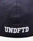 UNDEFEATED x NE ALL OVER FITTED