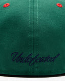 UNDEFEATED X NE ICON HAPPY FITTED
