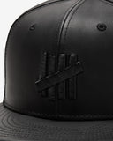 UNDEFEATED x NE LEATHER ICON FITTED