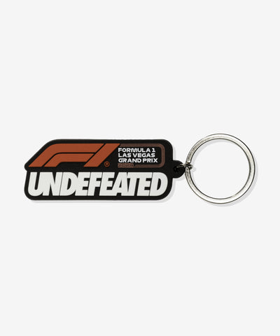 UNDEFEATED X F1 LVGP RAISED RUBBER KEYCHAIN