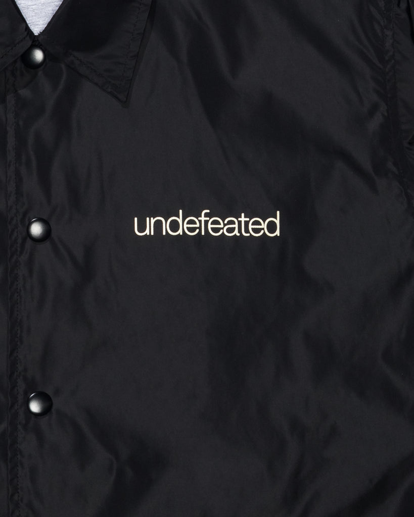 UNDEFEATED INC. COACHES JACKET