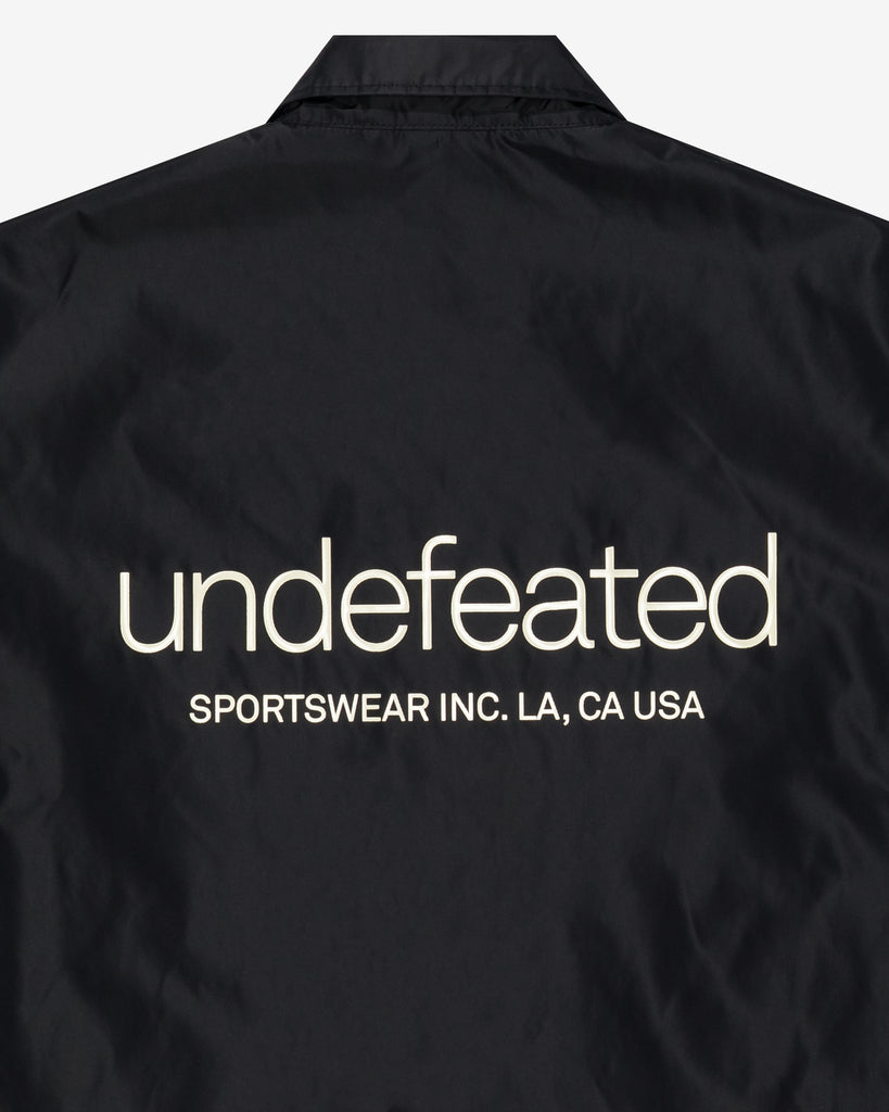 UNDEFEATED INC. COACHES JACKET