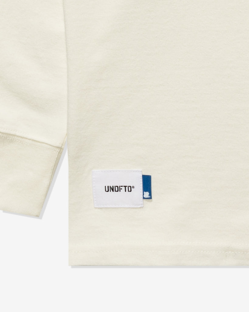 UNDEFEATED STENCIL L/S POCKET TEE