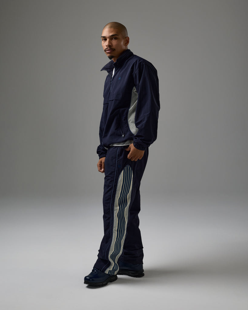 UNDEFEATED NYLON QUARTER ZIP PULLOVER