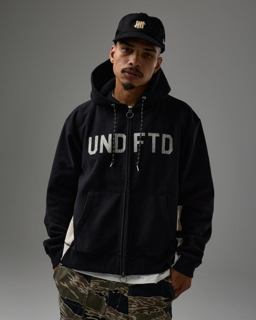 UNDEFEATED PANELED ZIP HOOD